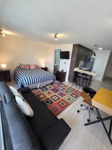 TV a/nebo společenská místnost v ubytování Delpinopropiedades 9 norte 450 entre 2 y 3 Poniente + 3 fotografie