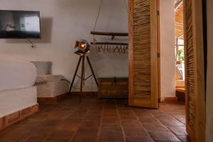 Μια τηλεόραση ή/και κέντρο ψυχαγωγίας στο LOLO & Lo- Casa privada con vista, hamaca y ubicación ideal 2 hab y Starlink +20 φωτογραφίες