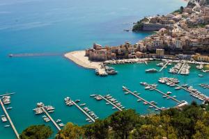an aerial view of a harbor with boats in the water at Verdeacqua Home in Castellammare del Golfo