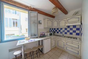 O bucătărie sau chicinetă la Apparemment hypercentre Aix-en-Provence