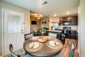 a kitchen and dining room with a table and chairs at Patio and Fenced Yard Peaceful Venus Retreat in Midlothian