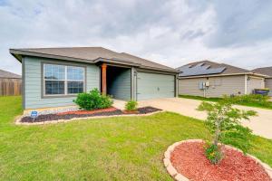 a house with a yard with a driveway at Patio and Fenced Yard Peaceful Venus Retreat in Midlothian