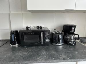 Kuchyň nebo kuchyňský kout v ubytování A&O Suites