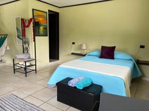 Voodi või voodid majutusasutuse Hotel Azul Coral toas