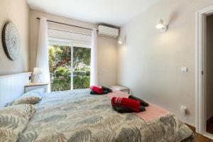 Posteľ alebo postele v izbe v ubytovaní Villa Golfy 8 Golf Bonmont Terres Noves