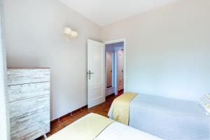 Posteľ alebo postele v izbe v ubytovaní Villa Golfy 8 Golf Bonmont Terres Noves