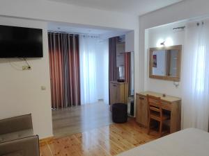 Μια τηλεόραση ή/και κέντρο ψυχαγωγίας στο Spartila Apartments