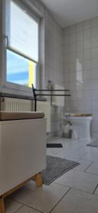 Ein Badezimmer in der Unterkunft Ferienhaus Wiese und Meer