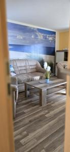 Ein Sitzbereich in der Unterkunft Ferienhaus Wiese und Meer