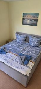 Ein Bett oder Betten in einem Zimmer der Unterkunft Ferienhaus Wiese und Meer