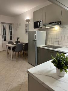 Köök või kööginurk majutusasutuses Apartmani Samec