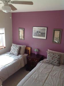 Postel nebo postele na pokoji v ubytování A Hyde Away Inn B&B