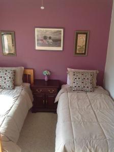 Postel nebo postele na pokoji v ubytování A Hyde Away Inn B&B