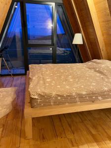 Postel nebo postele na pokoji v ubytování Piva Paradise