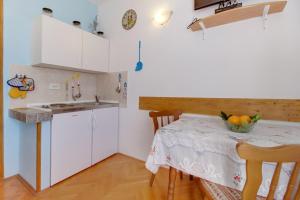 Kuchyň nebo kuchyňský kout v ubytování Apartment Agava + 18 fotografií