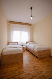 Letto o letti in una camera di Scutari Horizon