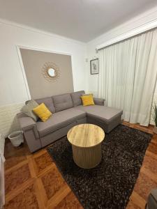 Uma área de estar em Island Haven - Cantinho da Ilha