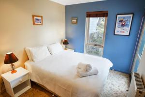 Postel nebo postele na pokoji v ubytování Whistler 3