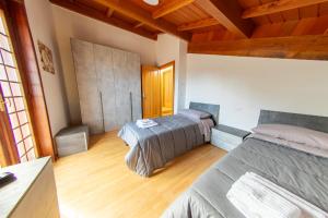 Postel nebo postele na pokoji v ubytování Il Rifugio del Principe