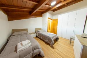 Postel nebo postele na pokoji v ubytování Il Rifugio del Principe