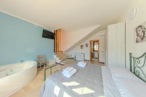 Postel nebo postele na pokoji v ubytování Il Rifugio del Principe