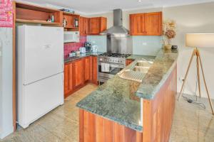 Kuchyň nebo kuchyňský kout v ubytování Whistler 1C