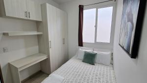 Postel nebo postele na pokoji v ubytování Acogedor y Centrico Apartamento + 24 fotografií