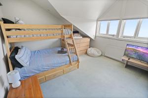 Postel nebo postele na pokoji v ubytování Whistler 1A