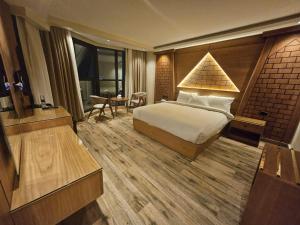 Voodi või voodid majutusasutuse Neom Pyramids Valley Boutique hotel toas