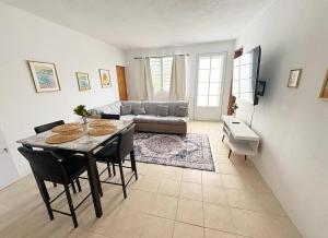 a living room with a table and a couch at Camilla's Getaway in Salinas