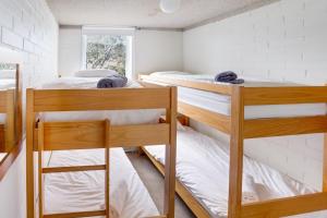 Postel nebo postele na pokoji v ubytování Snowflake 14