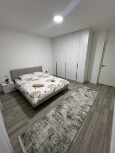 Ένα ή περισσότερα κρεβάτια σε δωμάτιο στο The Modern City