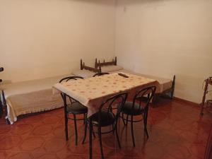 En eller flere senge i et værelse på Duplex la casita de papá