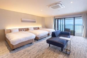 TAOYA Wakura客房内的一张或多张床位