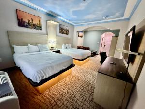 Voodi või voodid majutusasutuse Baymont by Wyndham Texas City toas