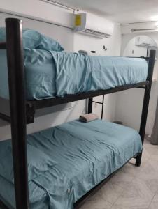 Postel nebo postele na pokoji v ubytování Casa León