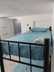 Postel nebo postele na pokoji v ubytování Casa León