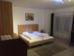 Postel nebo postele na pokoji v ubytování Cáfe 168