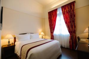 Voodi või voodid majutusasutuse Du Parc Hotel Dalat toas