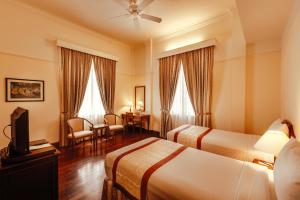 Voodi või voodid majutusasutuse Du Parc Hotel Dalat toas