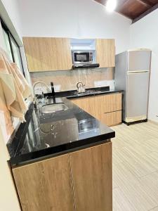 Η κουζίνα ή μικρή κουζίνα στο Cozy apartment in La Villa +7 φωτογραφίες