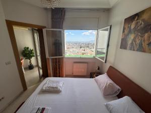 Postel nebo postele na pokoji v ubytování Vue panoramique & Confort comme un Hôtel