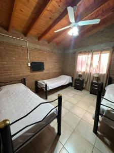 Postel nebo postele na pokoji v ubytování Cabañas Torres