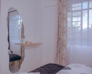 Voodi või voodid majutusasutuse The Escape Nanyuki toas