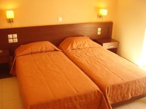Postel nebo postele na pokoji v ubytování Hotel Electra