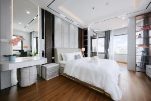 Crescendo Unique Studio客房内的一张或多张床位