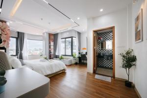 Crescendo Unique Studio客房内的一张或多张床位