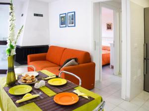 A seating area at Holiday homes in Santa Margherita di Pula