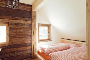 Voodi või voodid majutusasutuse Sandrisser-Hütte toas
