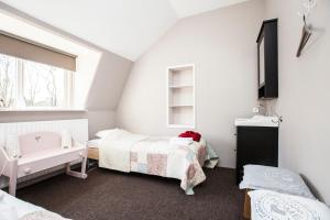 Säng eller sängar i ett rum på Klooster Nieuwkerk Goirle